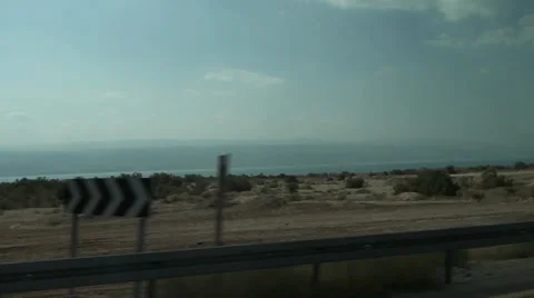 Kind on the Dead sea from the window of bus Stock Footage 39715721