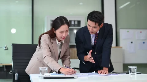 Kind leader executive manager share and discuss business solutions plan ide.. Video stock 312848593