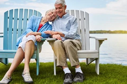 The kind of love that never grows old. an affectionate senior couple relaxing on Stock Photos