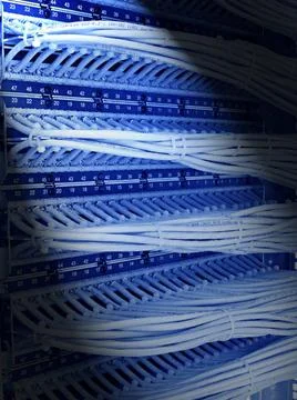 Kind of wiring closet patch panels with 6-th category in the background ki... Stock-Fotos