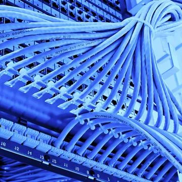 Kind of wiring closet patch panels with 6-th category in the background ki... Stock-Fotos