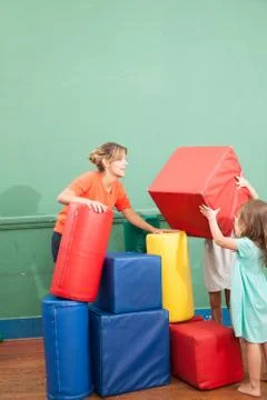 Kindergarden class playing Stock Photos