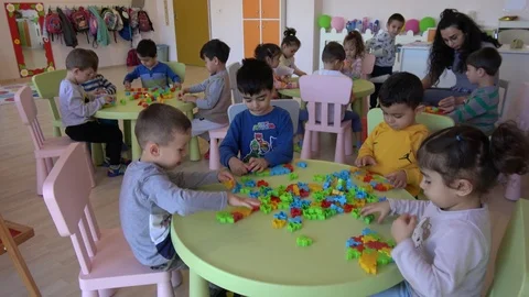Kindergarten class busy playing with con... | Stock Video | Pond5