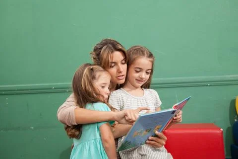 Kindergarten class reading a book Stock Photos