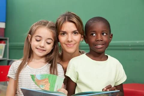 Kindergarten class reading a book Stock Photos