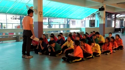 Kindergarten elementary Students are studying Physical Education Stock Footage 47302419