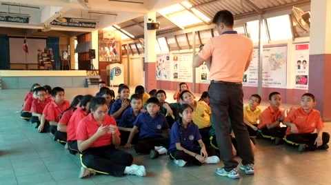 Kindergarten elementary Students are studying Physical Education Stock Footage 47302451