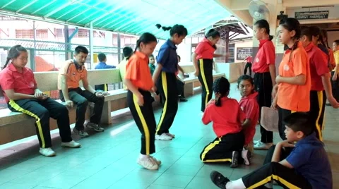 Kindergarten elementary Students are studying Physical Education Stock Footage 47302609