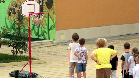 Kindergarten kids Playing Basketball Stock Footage