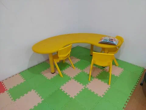 KINDERGARTEN U Shape STUDY TABLE Stock Photos