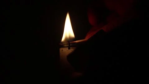 Kindling A Candle With Match On The Black Background Stock Footage 150666604