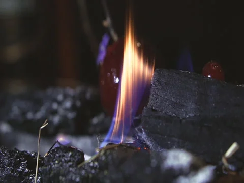 Kindling the fire on the coals Stock Footage 83785425
