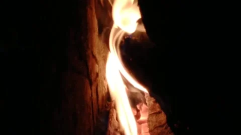 Kindling a fireplace in the bath complex inside Stock Footage 213000569