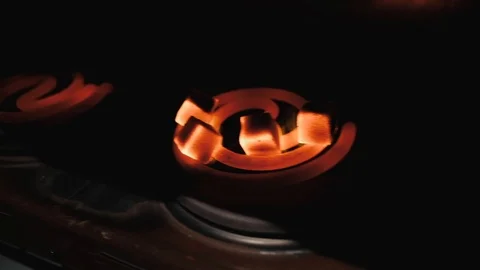 Kindling of square coal for a hookah on a special furnace with a hot spiral. Stock Footage 124647265
