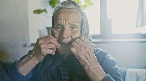 Kindly old lady with a sweet smile Stock Footage