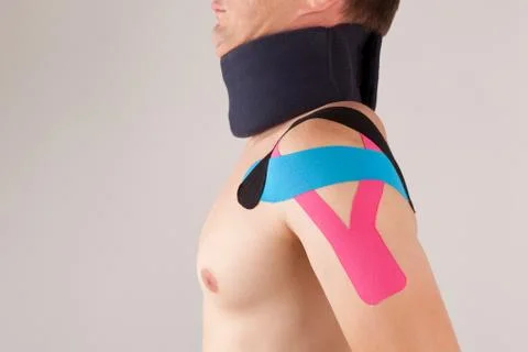 Kinesio taping for stabilizing shoulder Stock Photos
