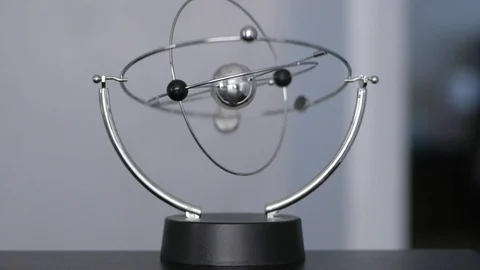 Kinetic Orbital Electromagnetic Pendulum Stock Footage 91990245