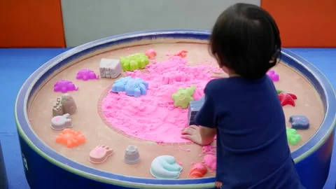 Kinetic sand play Stock Footage 245623613