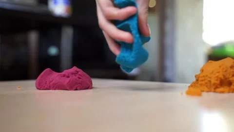 Kinetic sand touch hands, hand development Video stock 227477004