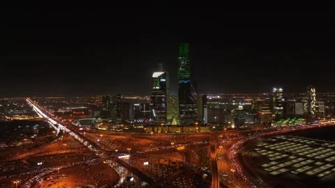 King Abdullah Financial Center in Riyadh city at night with high traffic Stock Footage 257516379