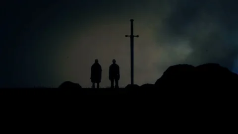 King Arthur and Merlin Looking at Sword Excalibur in a Rock Under a Storm Stock Footage 108439849