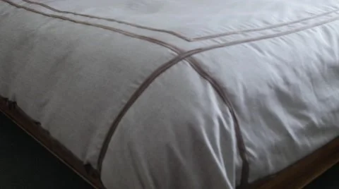 A king bed in a hotel room Stock Footage 50361306