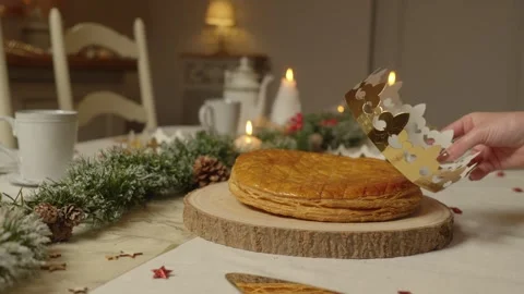King cake with crown placed on top Stock Footage 334656514
