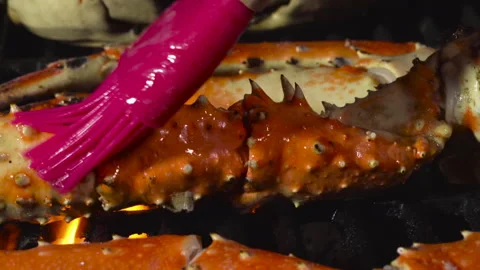 King Crab Legs on the Grill with Live Flames Stock Footage 243572009