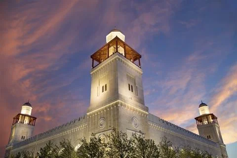 King Hussein Bin Talal mosque in Amman (at night), Jordan.  Against the clouds Stock Photos