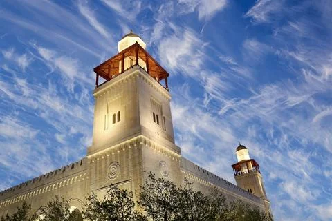 King Hussein Bin Talal mosque in Amman (at night), Jordan.  Against the clouds Stock Photos