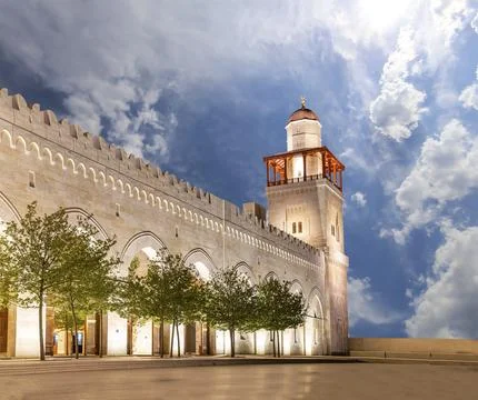 King Hussein Bin Talal mosque in Amman (at night), Jordan.  Against the clouds Stock Photos