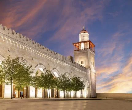 King Hussein Bin Talal mosque in Amman (at night), Jordan.  Against the clouds Stock Photos