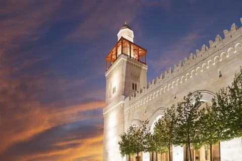 King Hussein Bin Talal mosque in Amman (at night), Jordan.  Against the clouds Stock Photos