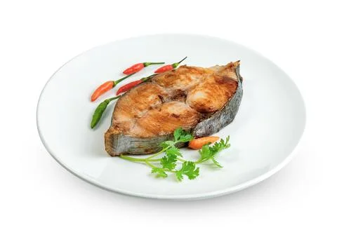 King mackerel or spotted mackerels steak with dish isolated on white backgr.. Stock Photos