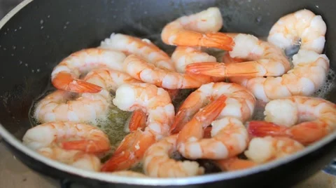 King prawns frying in the pan Stock Footage 52361426