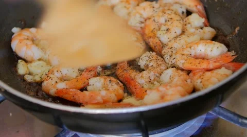 King prawns frying in the pan Stock Footage 52361456