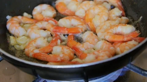 King prawns frying in the pan Stock Footage 52361465