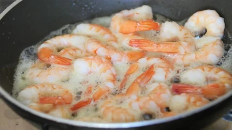 King prawns frying in the pan Stock Footage 52361531