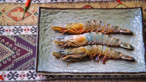King Prawns Lie on a Platter in a Restaurant Stock Footage 102272375