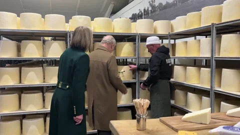 The King samples cheese on a visit to Lancashire  Stock Footage 328525680