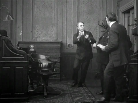 King shake hands with men after signing a deal - 1909 Stock Footage 95181828