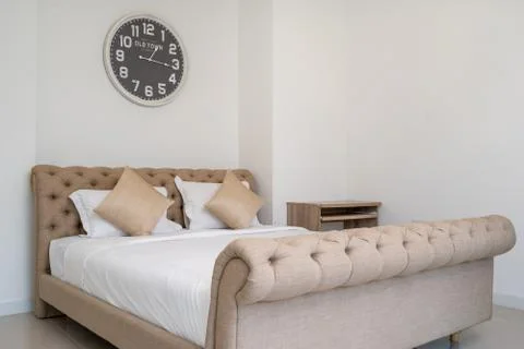 King size bed and dressing table in bedroom of house, villa, apartment and co Stock Photos
