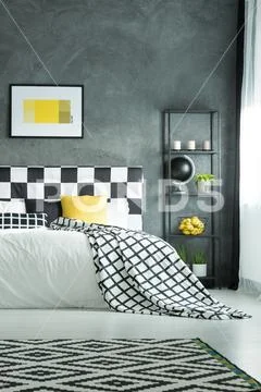 King-size bed in dark room Stock Photos