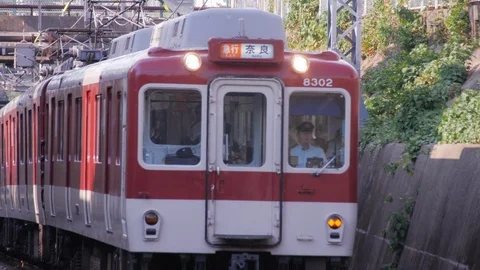 Kintetsu Line Express Train Arrives at Tambabashi Station - Kyoto, Japan Stock Footage 96004797