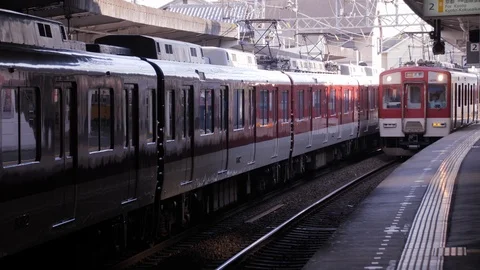 Kintetsu Line Express Train Arrives at Tambabashi Station (2) - Kyoto, Japan Stock Footage 100526797