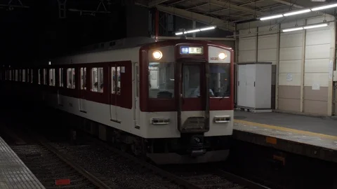 Kintetsu Local Line Train Arrives at Momoyamagoryomae Station - Kyoto, Japan Stock Footage 121184147