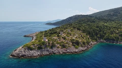 Kioni windmills drone move in and clockwise rotate, revealing harbour, Ithaca 스톡 동영상 345039974