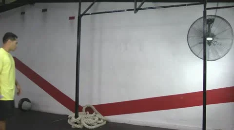 Kipping and butterfly pull ups crossfit exercise Stock Footage 22330156