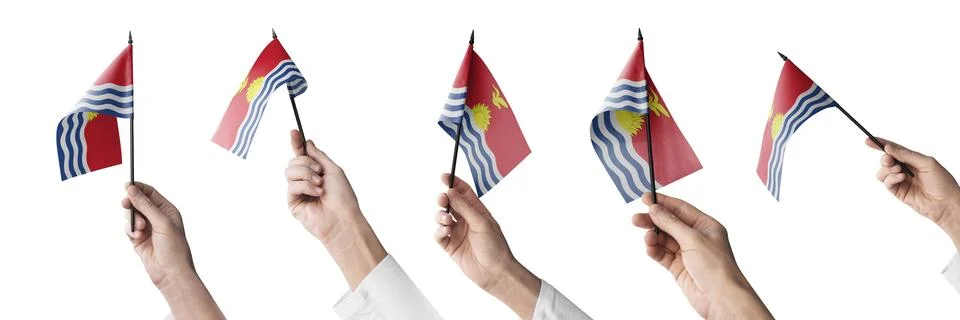 The Kiribati flag in hand in different angles on a white background Stock Illustration