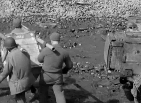 KISKA, ALASKA - 1943: Supply dump — carrying a crate between the stacks Stock-Footage 343135433
